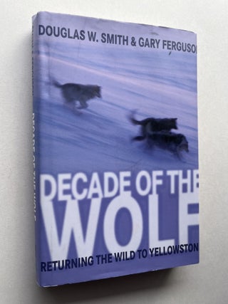 Item #1949 Decade of the Wolf: Returning the Wild to Yellowstone (inscribed to US Senator John V....