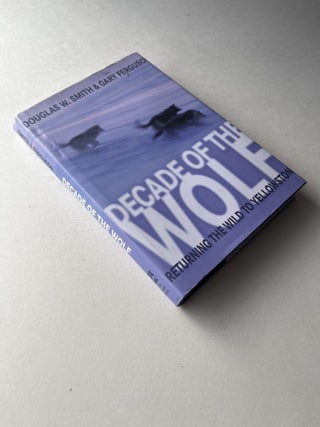 Decade of the Wolf: Returning the Wild to Yellowstone (inscribed to US Senator John V. Tunney)