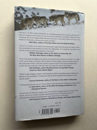 Decade of the Wolf: Returning the Wild to Yellowstone (inscribed to US Senator John V. Tunney)