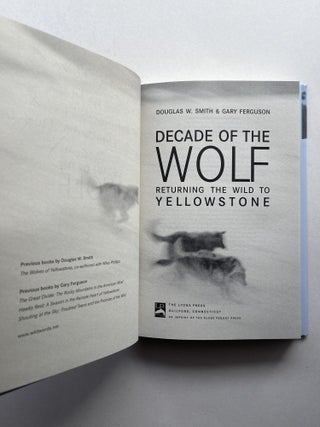 Decade of the Wolf: Returning the Wild to Yellowstone (inscribed to US Senator John V. Tunney)