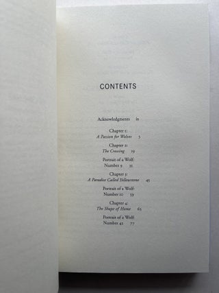 Decade of the Wolf: Returning the Wild to Yellowstone (inscribed to US Senator John V. Tunney)