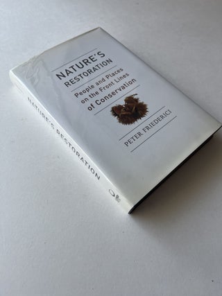 Nature's Restoration: People and Places on the Front Lines of Conservation (inscribed)