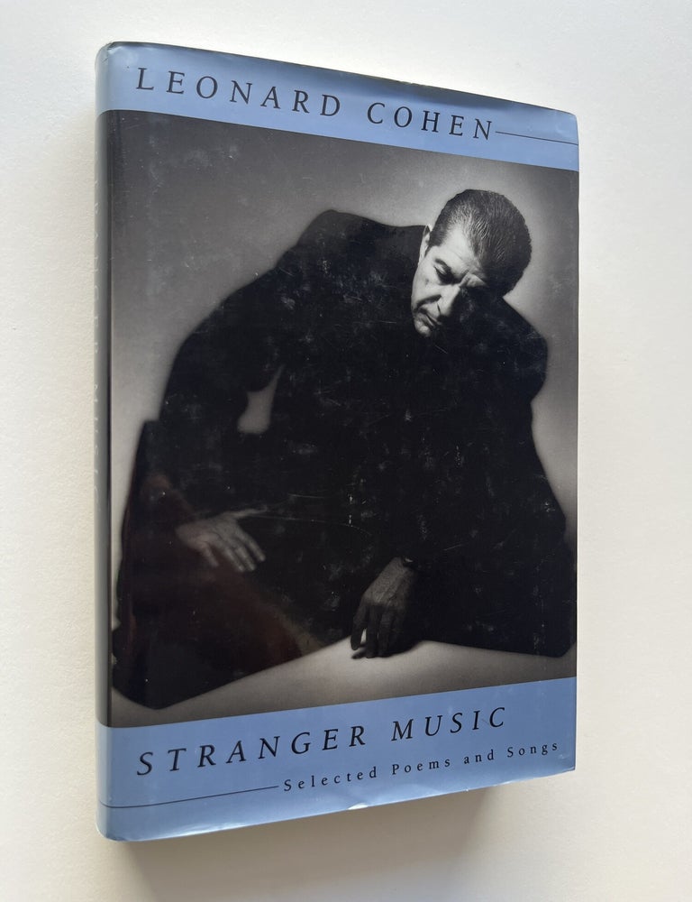 Item #2243 Stranger Music: Selected Poems and Songs (inscribed to Jim Harrison). Leonard Cohen, Jim Harrison.